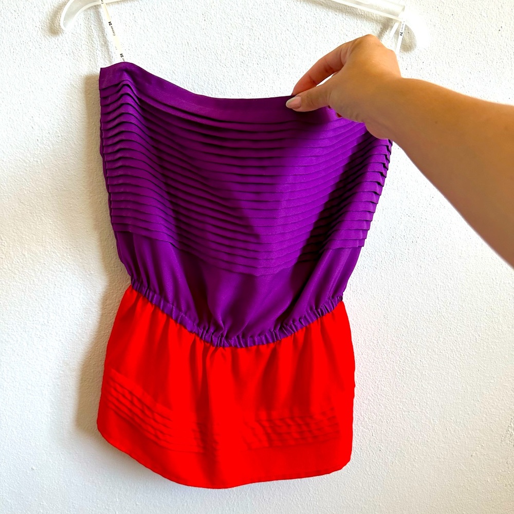 Pleated peplum strapless top
